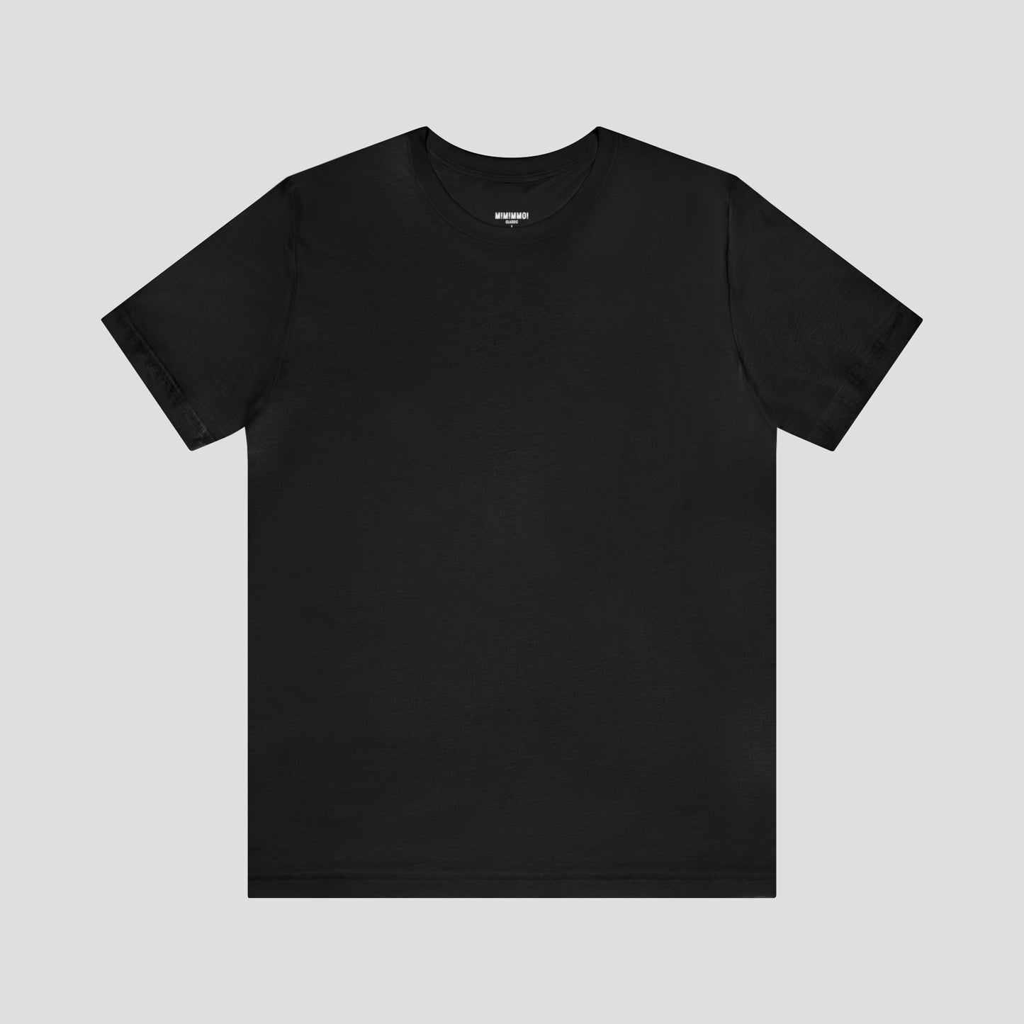 Black t-shirt against light gray background.