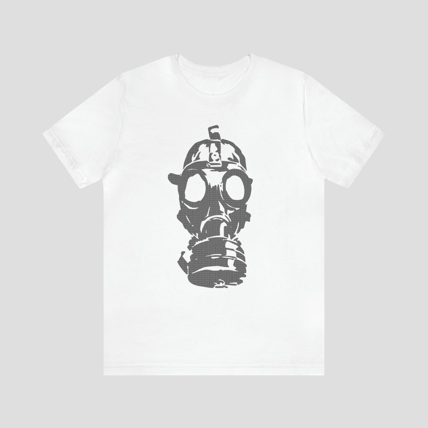 White t-shirt with a large gray image of a gas mask in center, against a gray background.