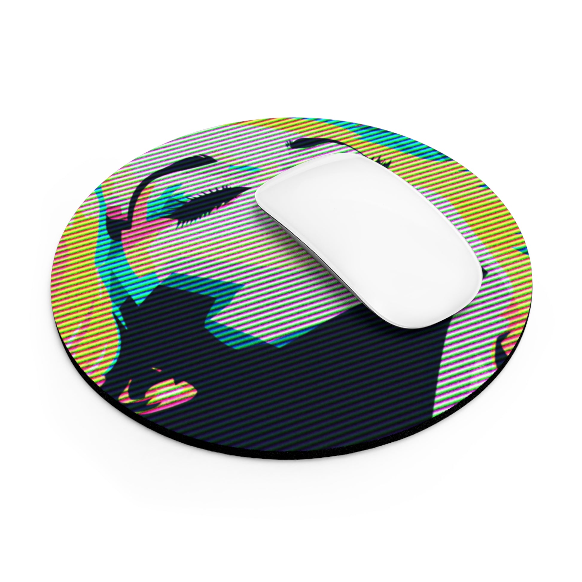 Tilted view of computer mouse on round mousepad with colorful pop art illustration of blonde woman's face with eyes closed and looking up, against a white background.