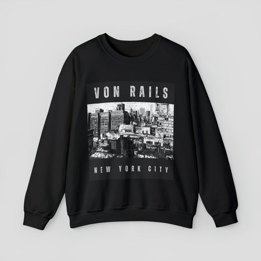 Front view of black sweatshirt with a black and white distressed image of New York buildings with the words Von Rails at the top and New York City at the bottom in distressed white lettering, against a gray background.