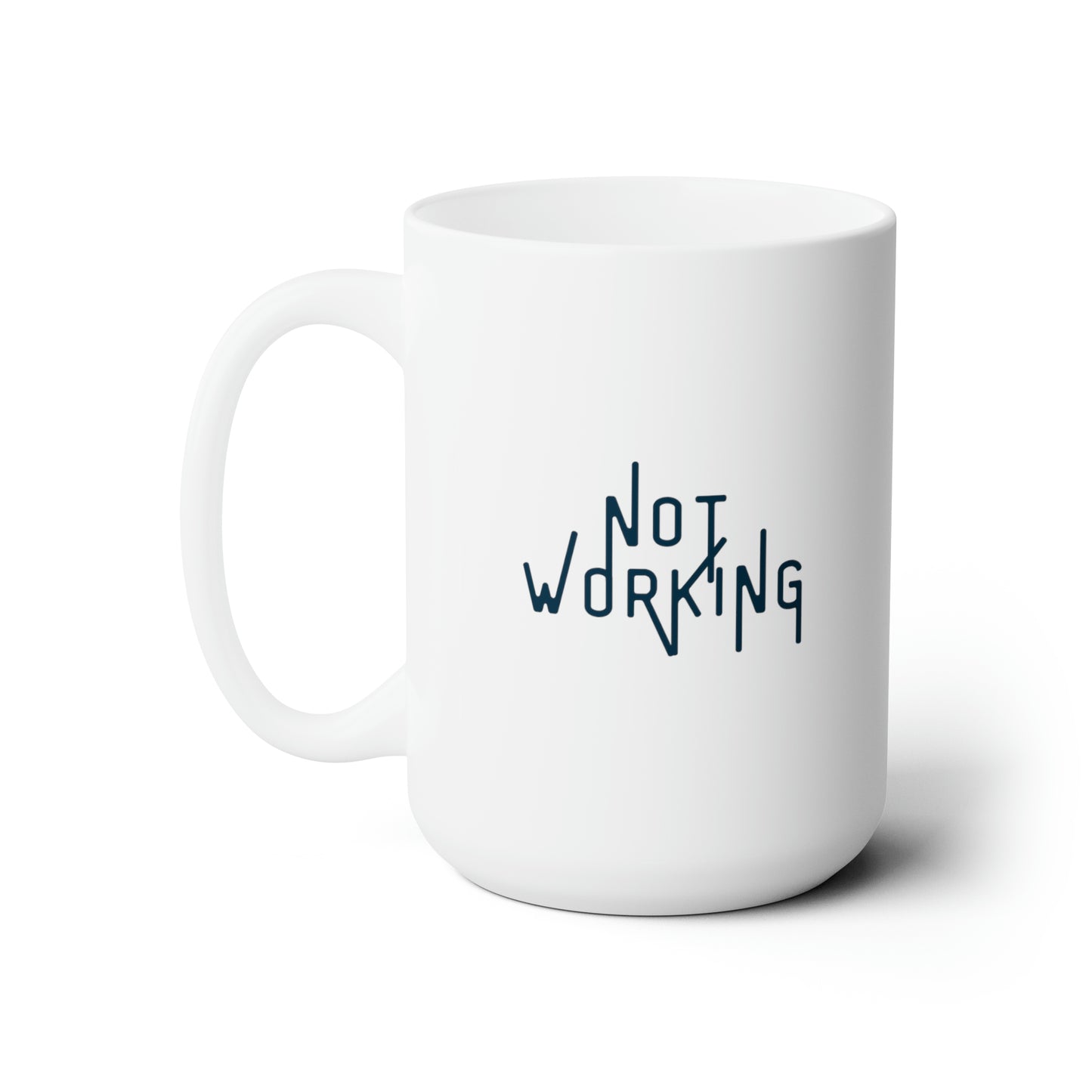 The words "Not Working" in a navy font with thin extended letters on white mug with left handle against a white background.