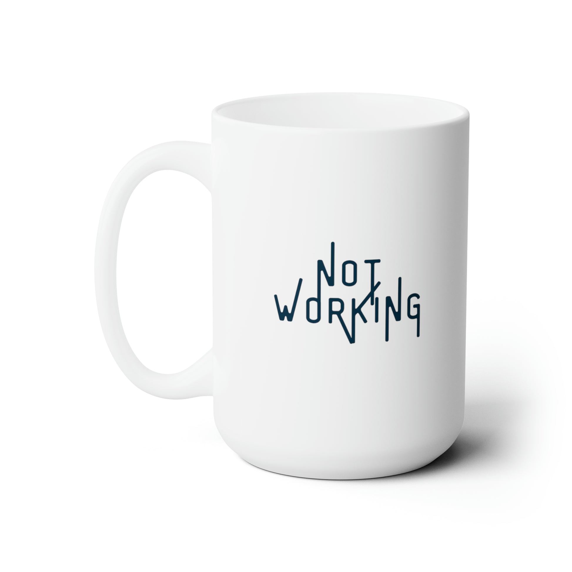 The words "Not Working" in a navy font with thin extended letters on white mug with left handle against a white background.