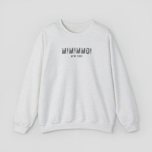 Light gray sweatshirt with the words Mimimmoi New York in distressed gray block letters across the chest, against a gray background.