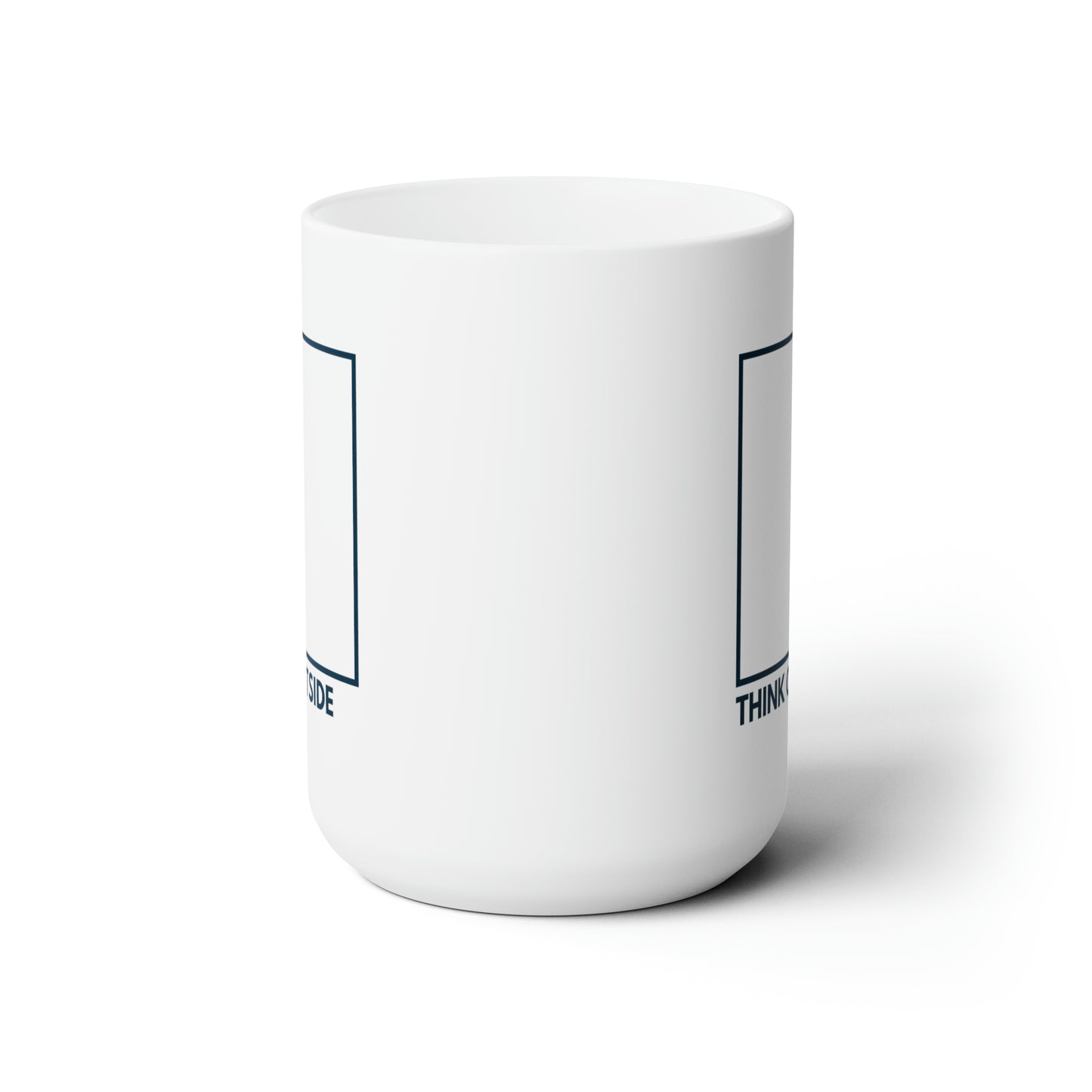 Side view of large navy blue square about the words "Think Outside" in navy capitalized letters on both sides of a white mug against a white background.