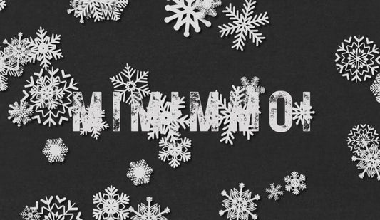 Falling white snowflakes against a black background. The word "MIMIMMOI" is in the center of the video.